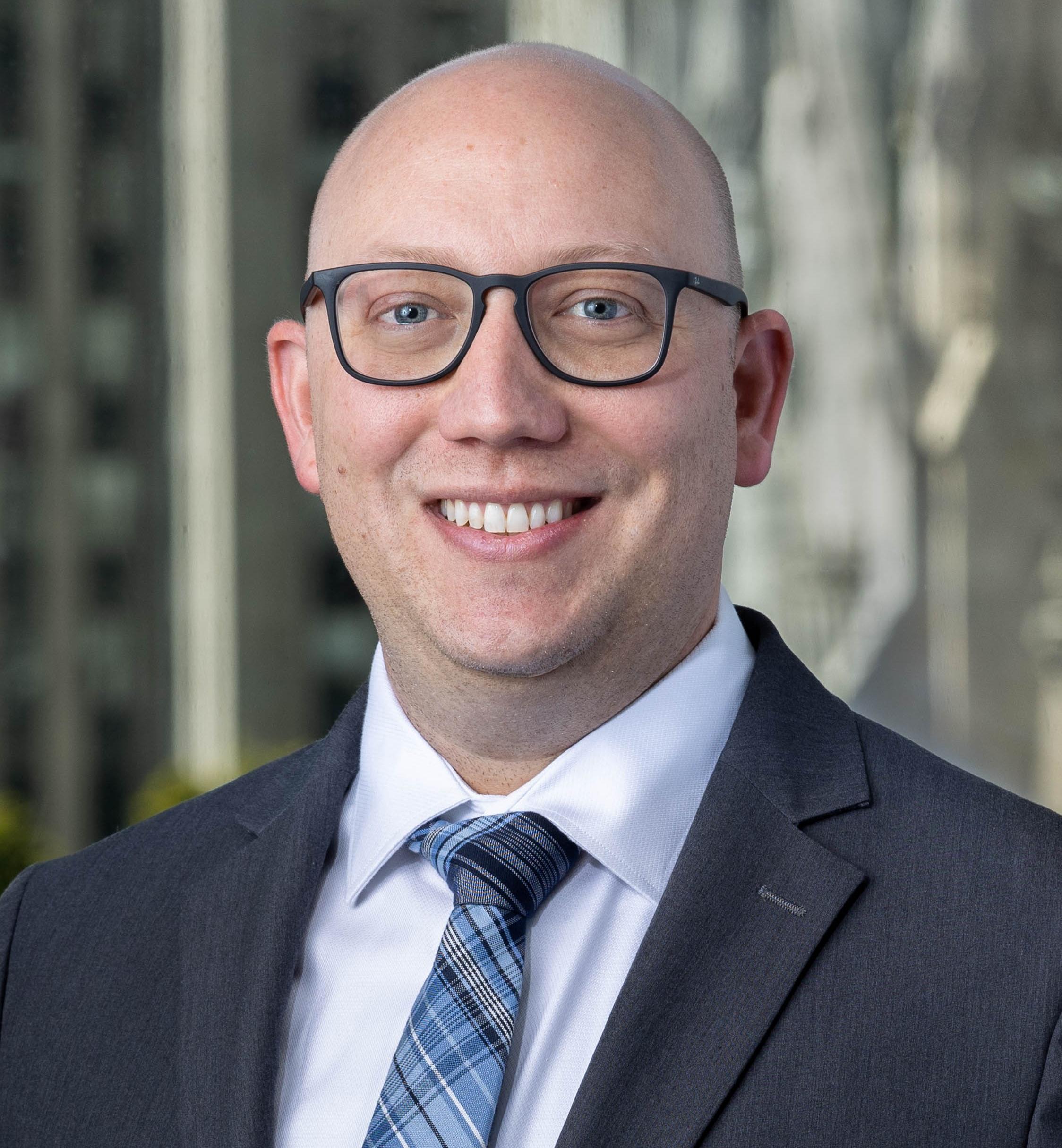 Headshot photo of Adam C. McCall